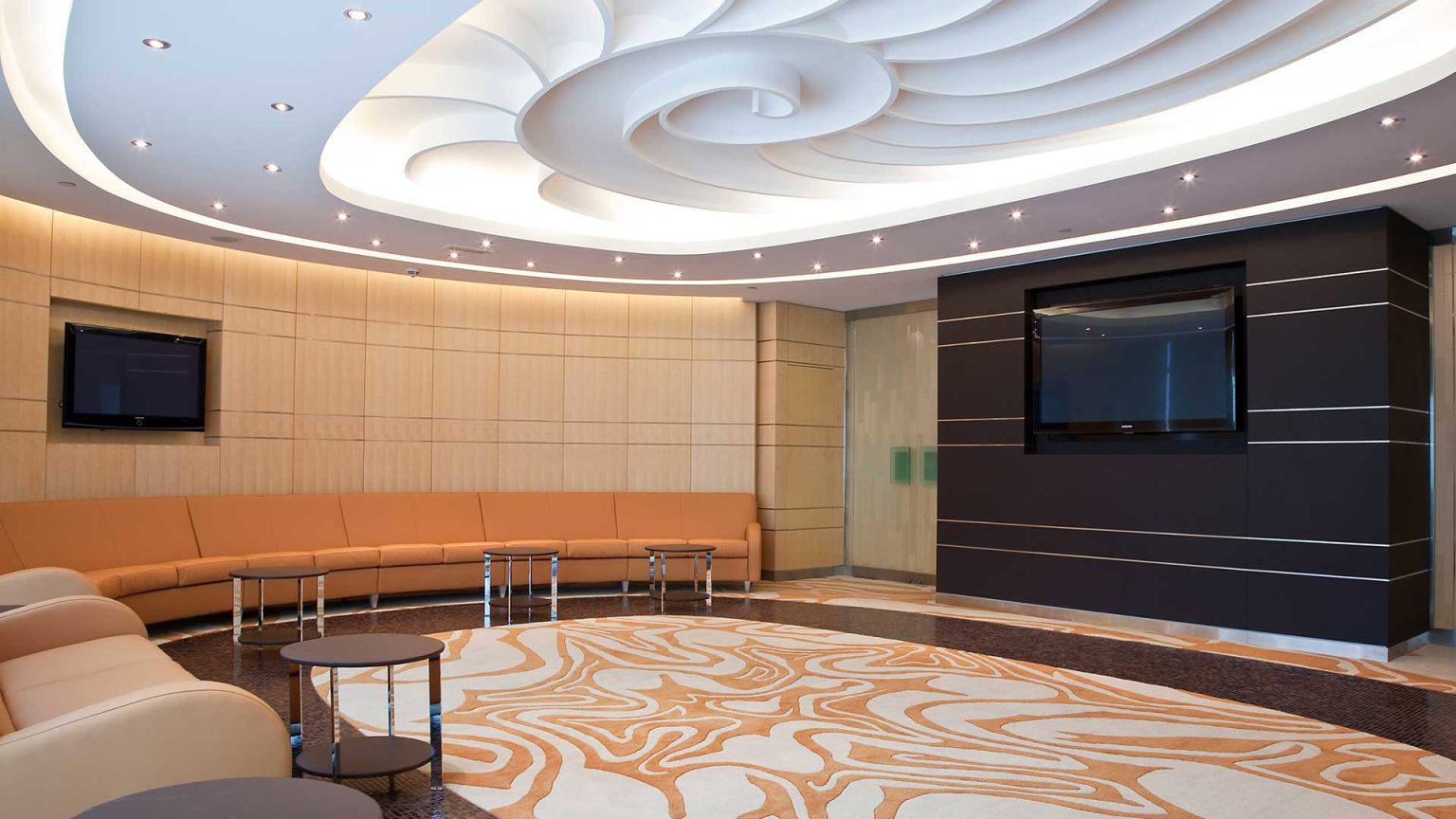 Reception lounge with sculpted plaster ceiling, delivered by EJI Interiors